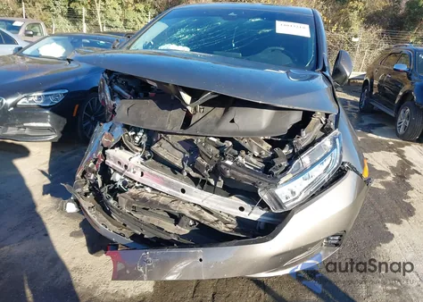 2022 Honda Odyssey Touring z USA, uszkodzony, nr VIN 5FNRL6H86NB049126